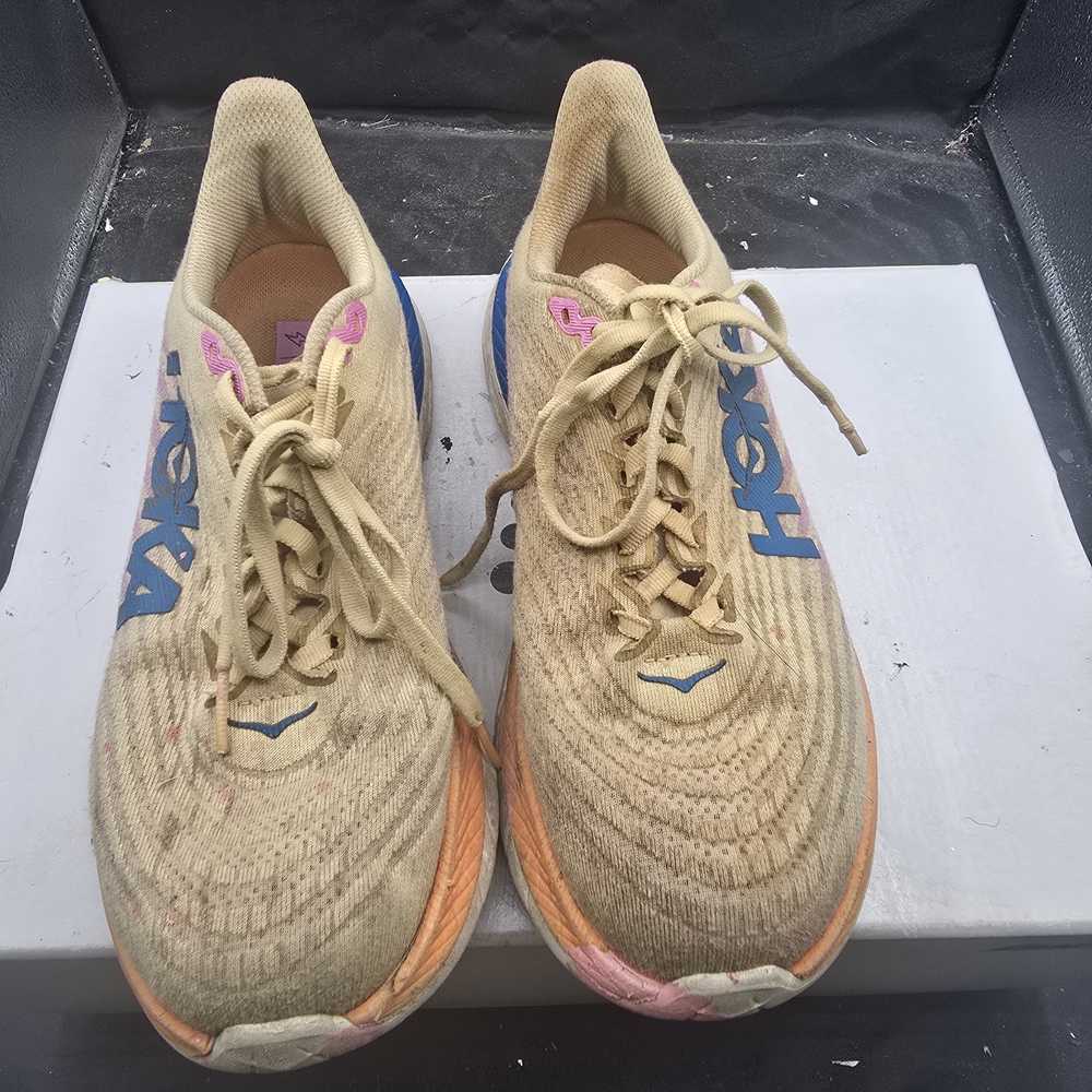 Hoka Sand Running Shoes with Blue and Pink Highlights